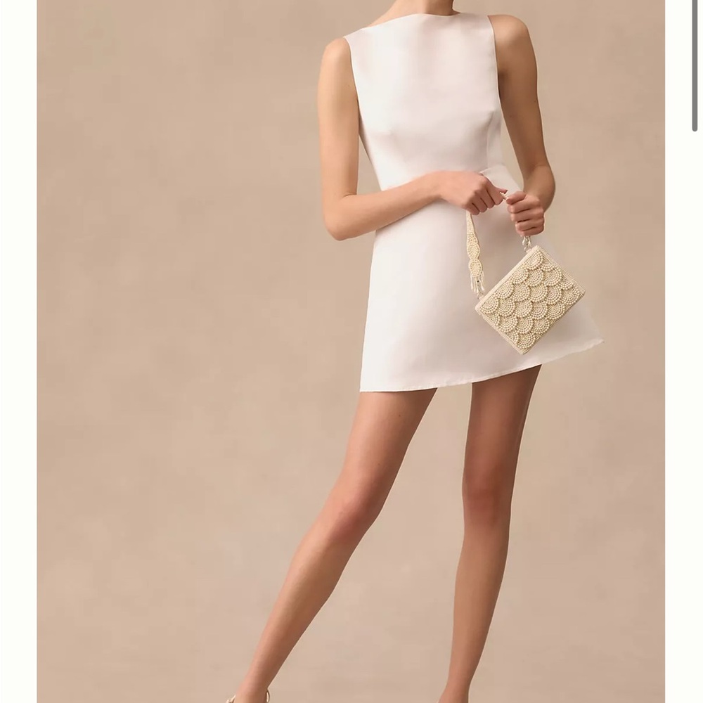 White Mini Dress with a stylish design perfect for summer